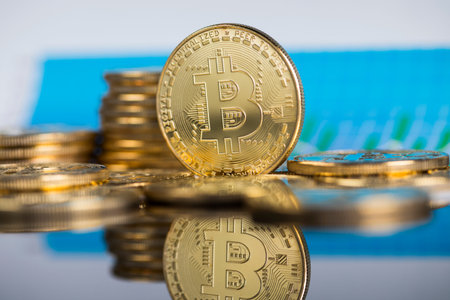 Gold Bitcoin on the background of the chart