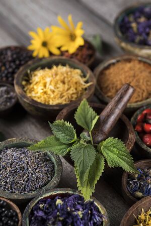 Natural remedy,Herbal medicine and wooden table backgroundの写真素材