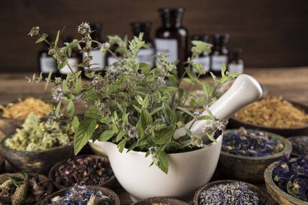 Natural remedy and wooden table backgroundの写真素材