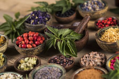 Natural remedy,Herbal medicine and wooden table backgroundの写真素材