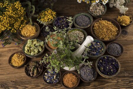 Natural remedy and wooden table backgroundの写真素材