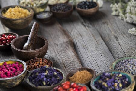 Natural remedy,Herbal medicine and wooden table backgroundの写真素材
