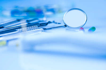 Dentist equipment on blue backgroundの写真素材