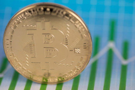 Gold Bitcoin on the background of the chart