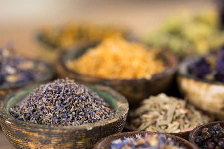 Herbs medicine and vintage wooden backgroundの写真素材