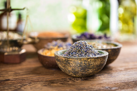 Natural medicine and mortar, healing herbs backgroundの写真素材