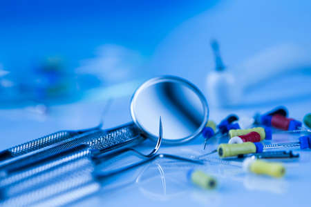 Dentist equipment on blue backgroundの写真素材