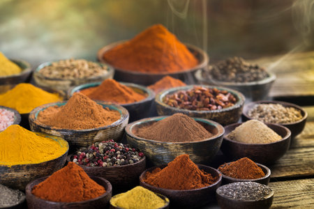 Smoke, Aromatic spices on wooden background