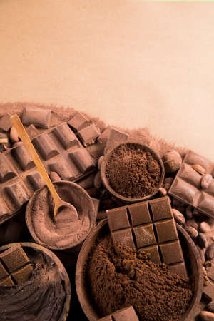Aromatic cocoa and chocolate on natural paper backgroundの写真素材