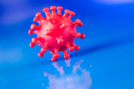 Coronavirus 2019-nCov novel coronavirus concept. Virus model on blue background.の写真素材