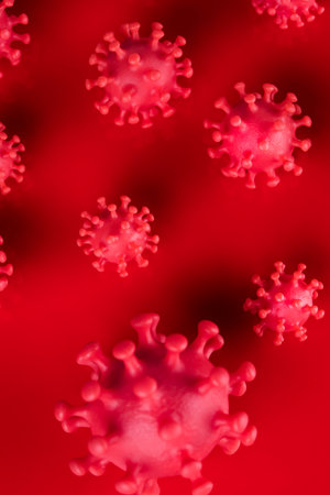 Coronavirus 2019-nCoV on red background.の写真素材