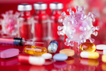 Syringe and vial of medicine, SARS pandemic backgroundの写真素材
