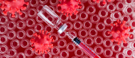 Bottles of Vaccine and syringe, pandemic backgroundの写真素材