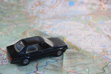 Model of black car on a mapの写真素材