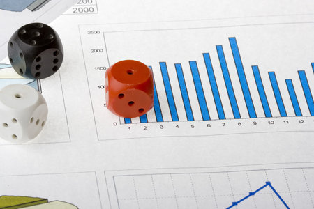 report with diagrams with dices on itの写真素材