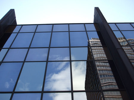 Clouds and Building Reflected with Sky