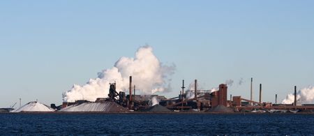 Waterfront Industry Lets Out Smoke Cloudの写真素材