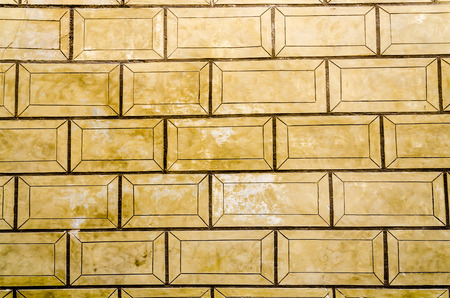 Old renaissance scratched sgraffito wall from old building.の写真素材