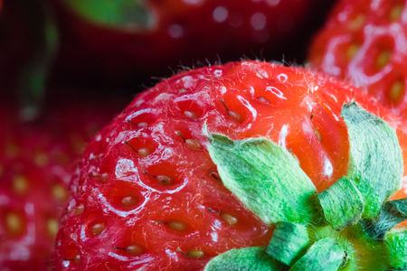 Detail of red ripe strawberry. Shallow depth of field, macro photography.の写真素材