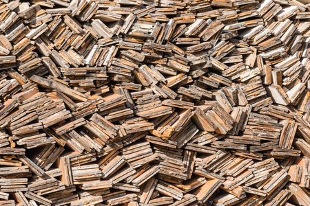 Folded wood ready for winter. Texture.の写真素材
