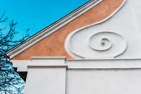 Part of the roof of a family house in the style of rural baroque.の写真素材