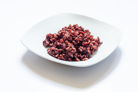 Thai rice berry in white dish on groundの写真素材