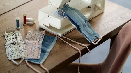 handmade face masks and a sewing machineの写真素材