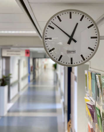 clock in an hospital hallwayの写真素材