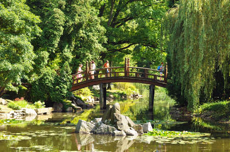 WROCLAW/POLAND - 07/27/2014: The beautiful view on the fairy-tale bridge crossing the river.のeditorial素材