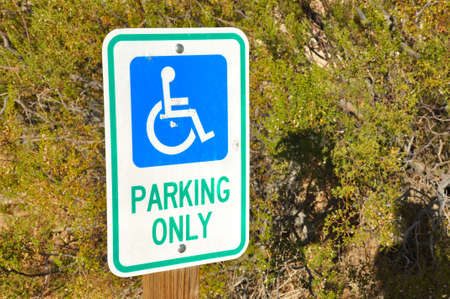 Disabled person parking only sign in nature of Joshua Tree National Park.のeditorial素材