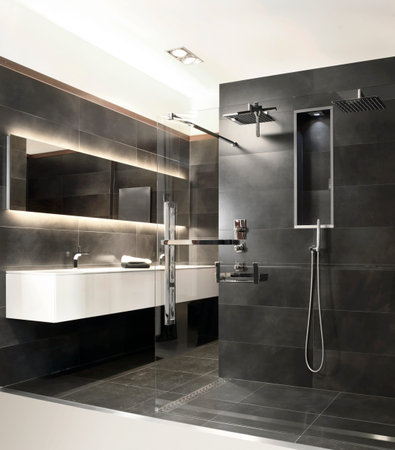 Bathroom with gray stone and modern rainshowerのeditorial素材