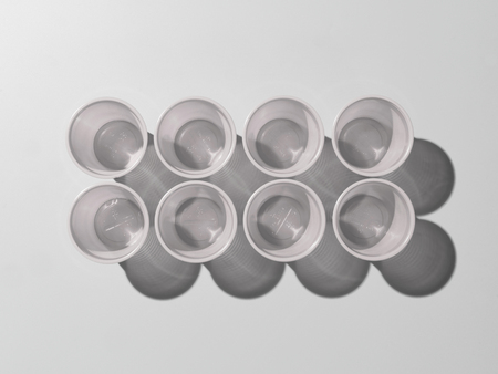 Empty disposable Plastic cups from aboveの写真素材