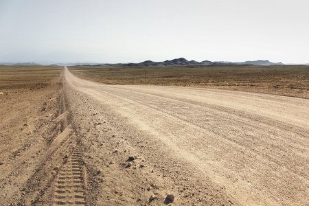Gravel road to the Fish River Canyon, south of Namibia, Africa. Dry seasonの写真素材