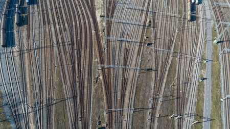 Cargo trains. Aerial view of colorful freight trains. Railway station. Wagons with goods on...