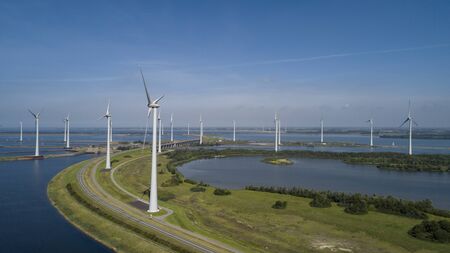 Wind turbine from aerial view, Drone view at windpark krammersluizen a windmill farm in the lake grevelingen in the Netherlands,Sustainable development, renewable energyの写真素材