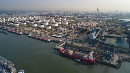Oil refinery plant from industry zone, Aerial view oil and gas industrial, Refinery factory oil storage tank and pipeline steelの写真素材