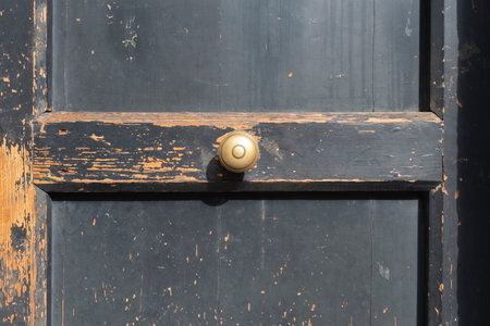 metal vintage handle on a old wooden doorの写真素材