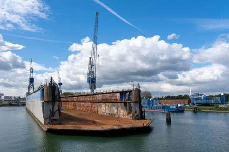 Floating dry dock with cranes in the port of rotterdamの写真素材