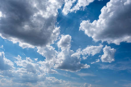 blue sky background with white clouds in italyの写真素材
