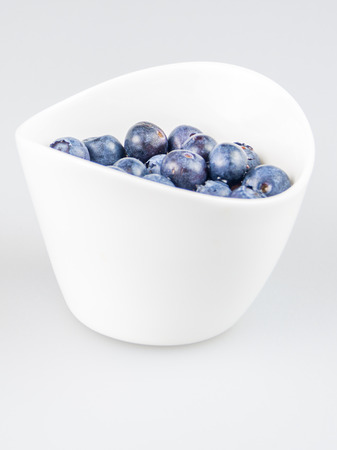 one cup of pudding with blueberriesの写真素材