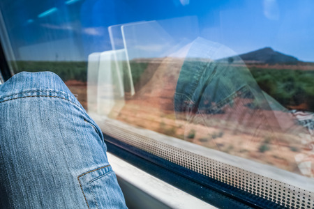 enjoing the view of spanish nature from an high speed trainの写真素材