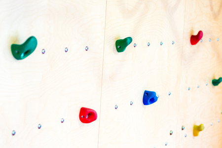 artificial climbing wall  in indoor children's playground, little gymの写真素材