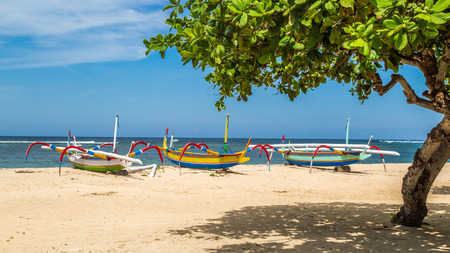 beach in bali, three boats ready to sail, sanurの写真素材