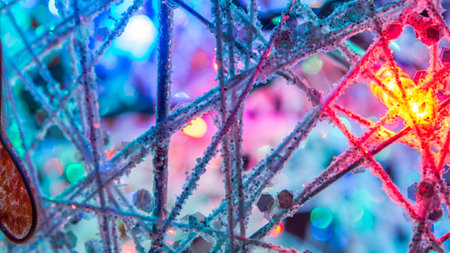 abstract christmas tree and ball decorated with bright lights and butterflies