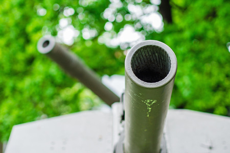 an old russian canon aiming on the skyの写真素材