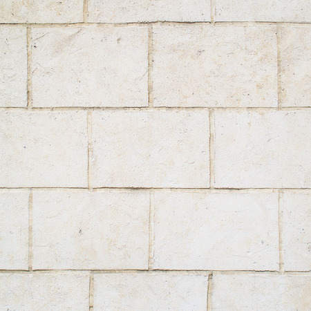 uncared and crooked wall on one european castle with a lot of scratches and irregularitiesの写真素材