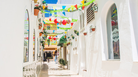 narrow street in a spanish town on costa del solの写真素材