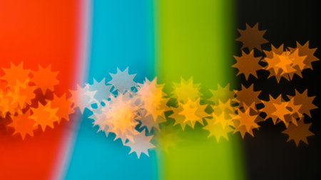 beautiful bokeh made of blurred lights in the form of sun on  multicolored background