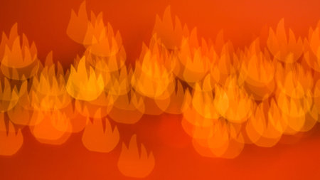 beautiful bokeh made of blurred lights in the form of flames on red background