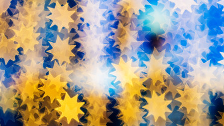 beautiful bokeh made of warm orange blurred lights in the form of suns on blue background, special...